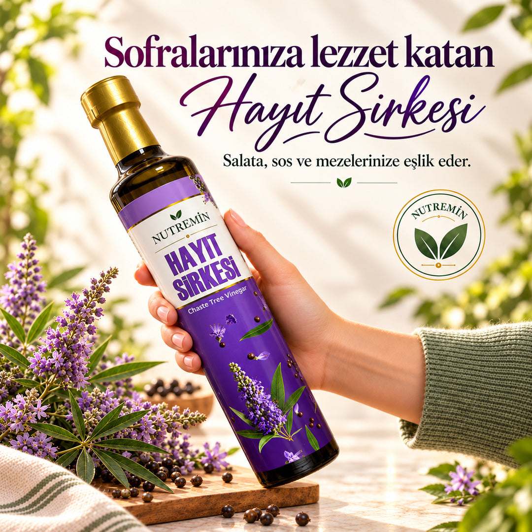 Nutremin Hayıt Sirkesi 500 ml, çiçeklerin yanında elde tutulan şişe ve tanıtım görseli.